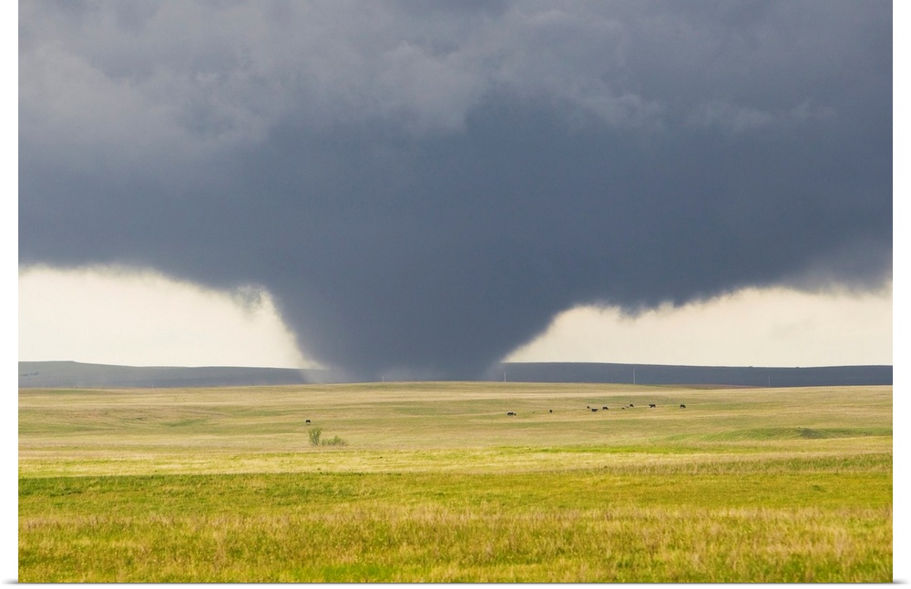 A powerful tornado rips through the South Dakota countryside.