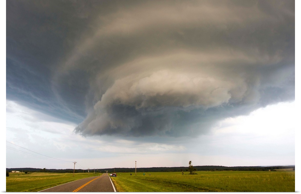 A rotating supercell thunderstorm and wall cloud.