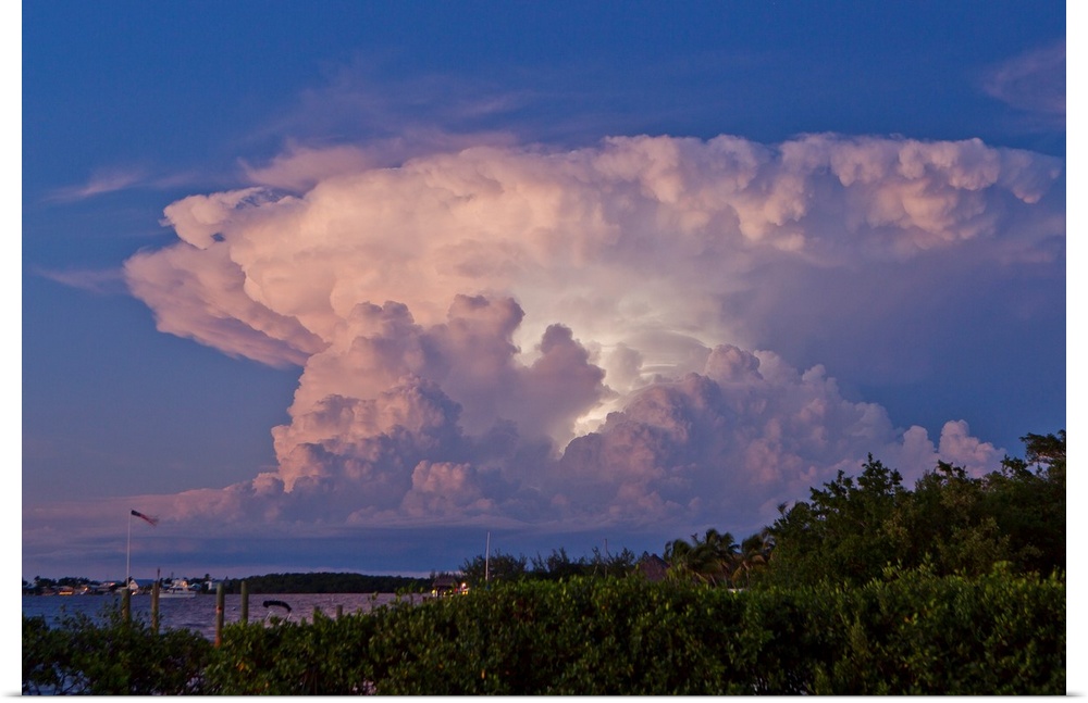 A supercell anvil cloud filled with discharging electricity.