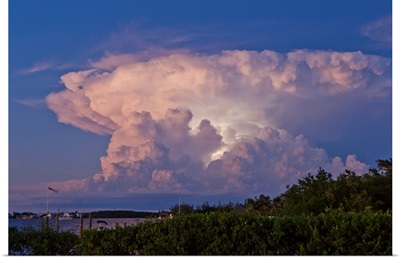 A supercell anvil cloud filled with discharging electricity