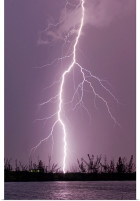 Cloud to ground lightning strike during intense summer thunderstorm