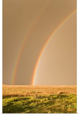 Double rainbows on the backside of a thunderstorm in Tornado Alley