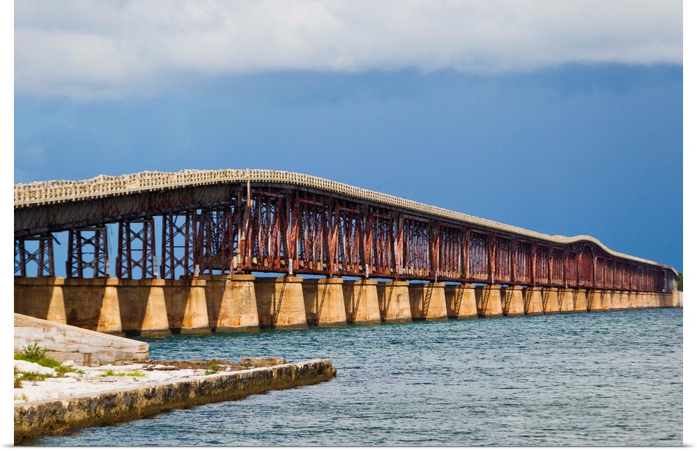 The old and retired Bahia Honda Bridge was built by Henry Flagler as part of the Overseas Railroad which was completed in ...