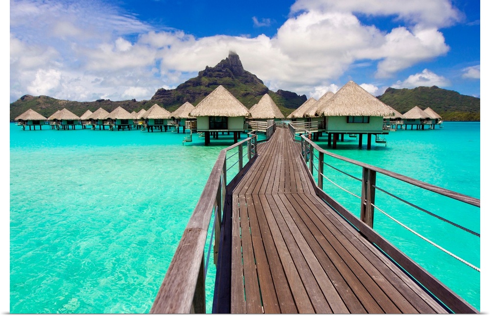 Boardwalk to the overwater bungalows at the Le M..ridien resort in Bora Bora in the French Polynesian islands.