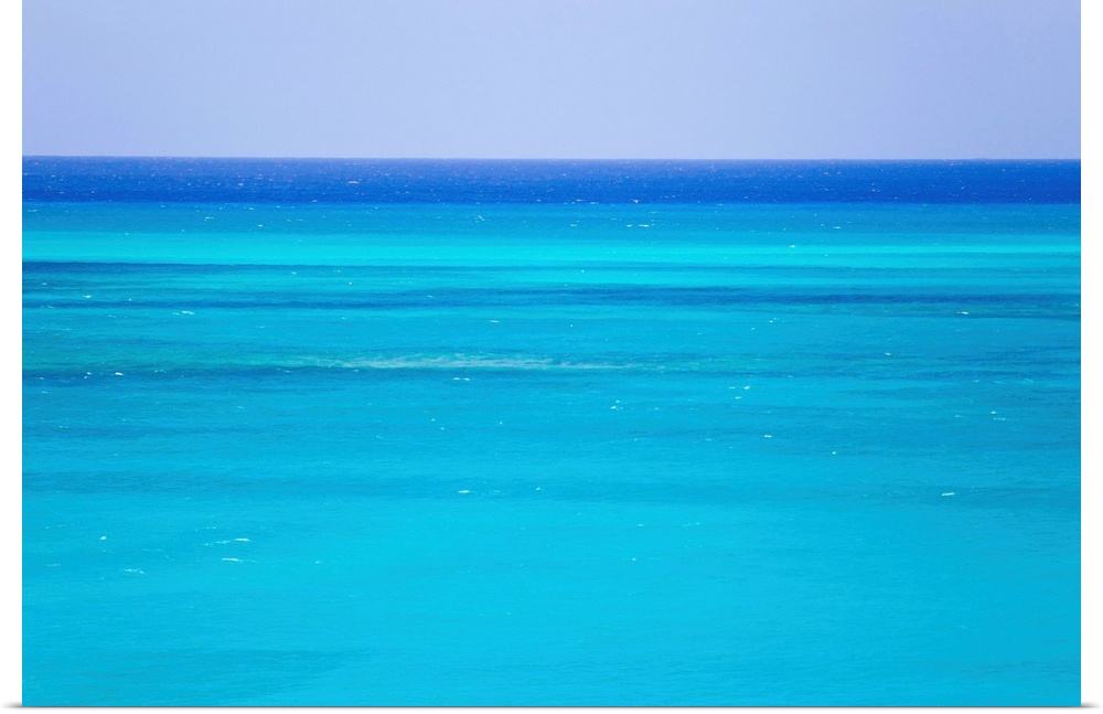 The turquoise waters of Grace Bay, and the Atlantic Ocean beyond.