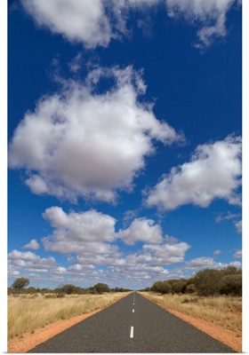 Cumulus Clouds and Desert Road in Northern Territory Australia