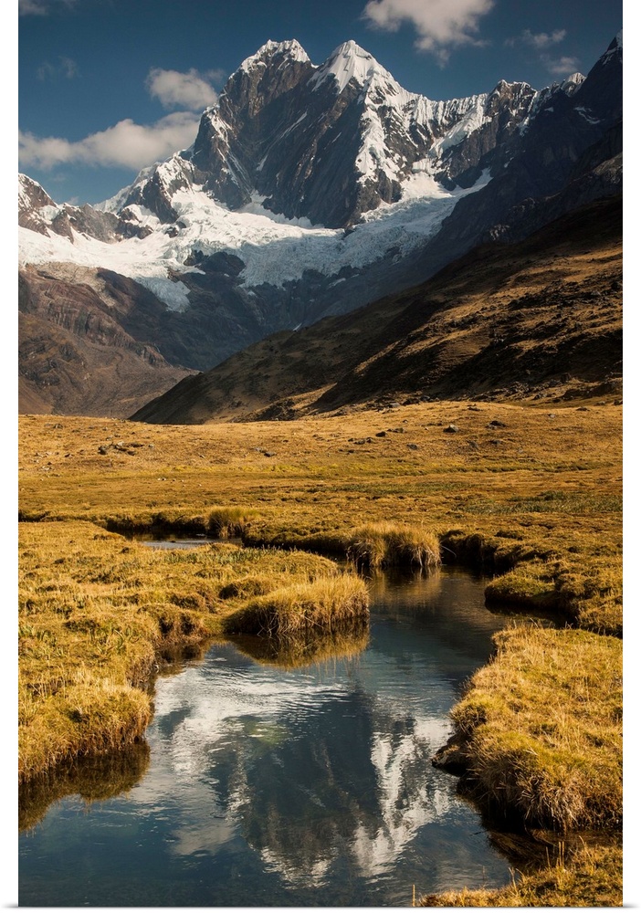Jirishanca peak, 6090 metres, reflection in stream running into Mitococha lake, Cordillera Huayhaush, Andes mountains, Peru