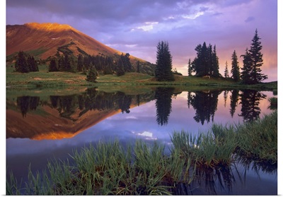 Mount Baldy at sunset reflected in lake along Paradise Divide, Colorado