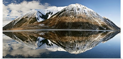 Mountains reflecting in Lake Pearson, Castle Hill Basin, Canterbury, New Zealand