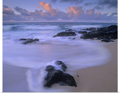 Rolling waves at dusk at Sandy Beach, Oahu, Hawaii