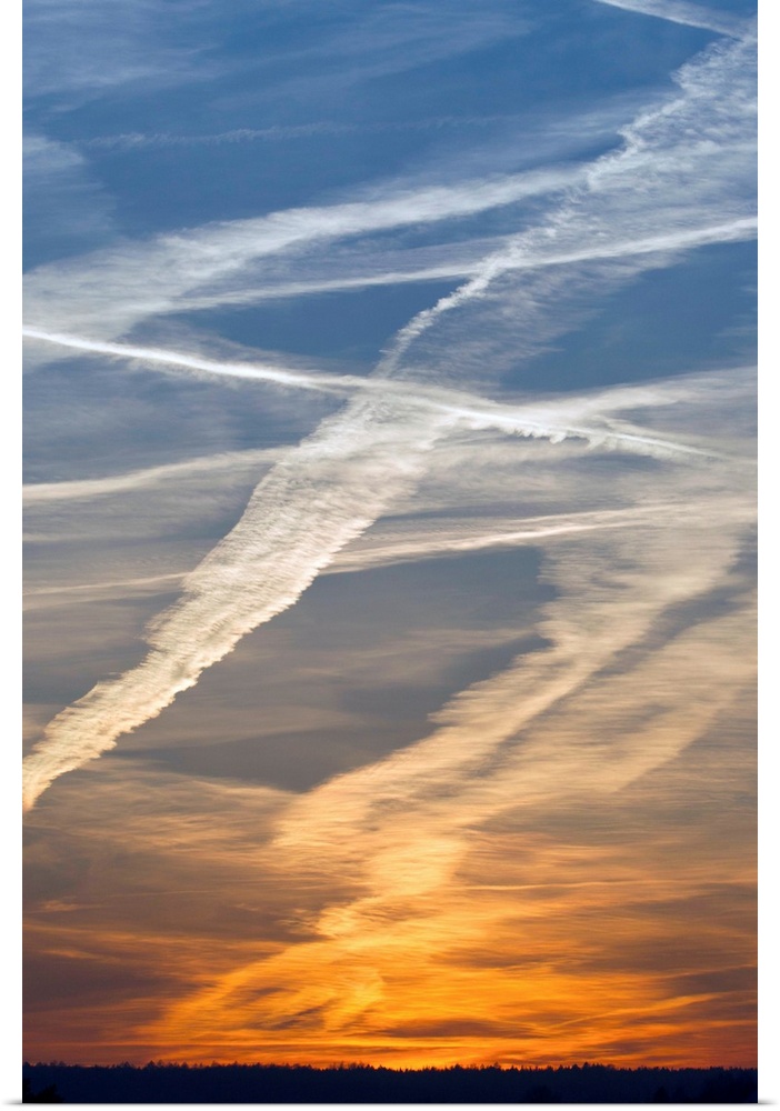 Vapour Trails at sunset, from airliners, Germany