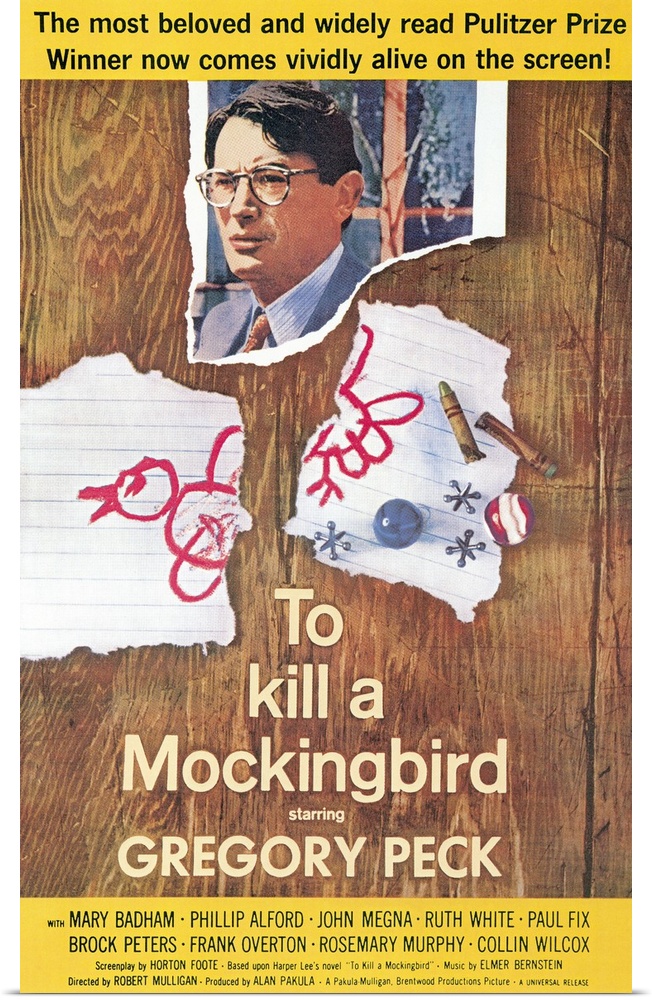 Vertical, large movie advertisement for the 1963 film, To Kill a Mockingbird, starring Gregory Peck.  On a wooden surface ...