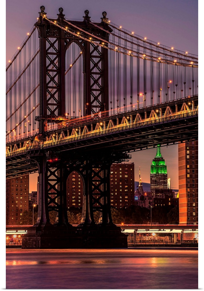 A photograph of the Manhattan bridge at twilight.