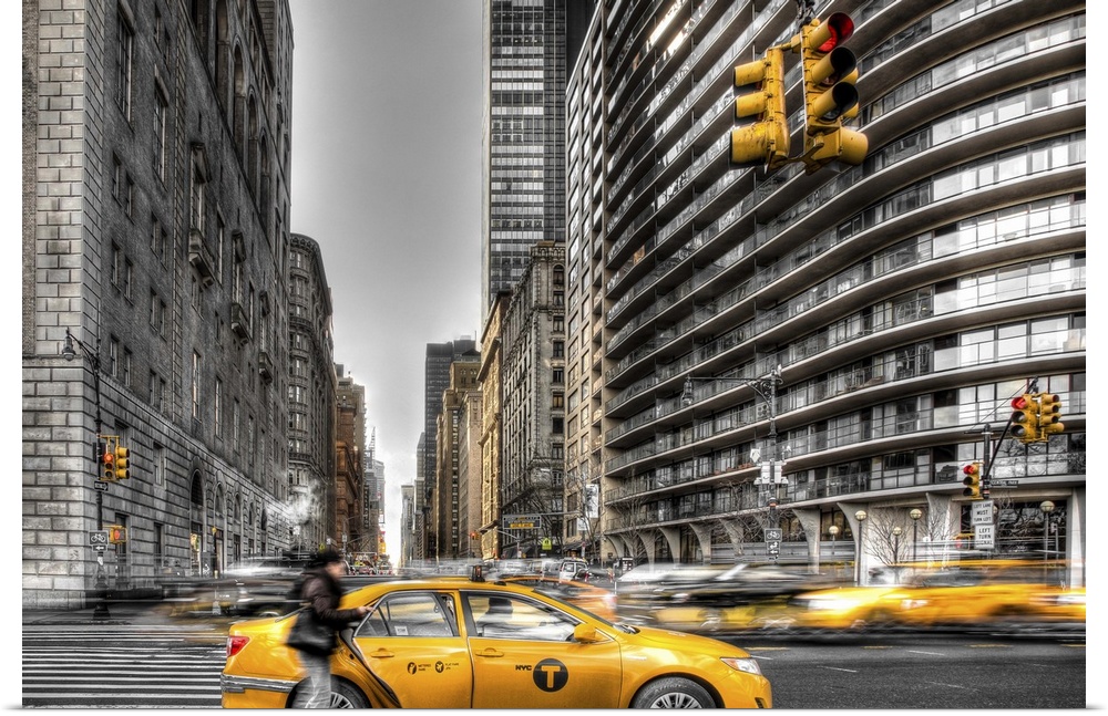 HDR photograph of a stopped yellow taxi in New York city.