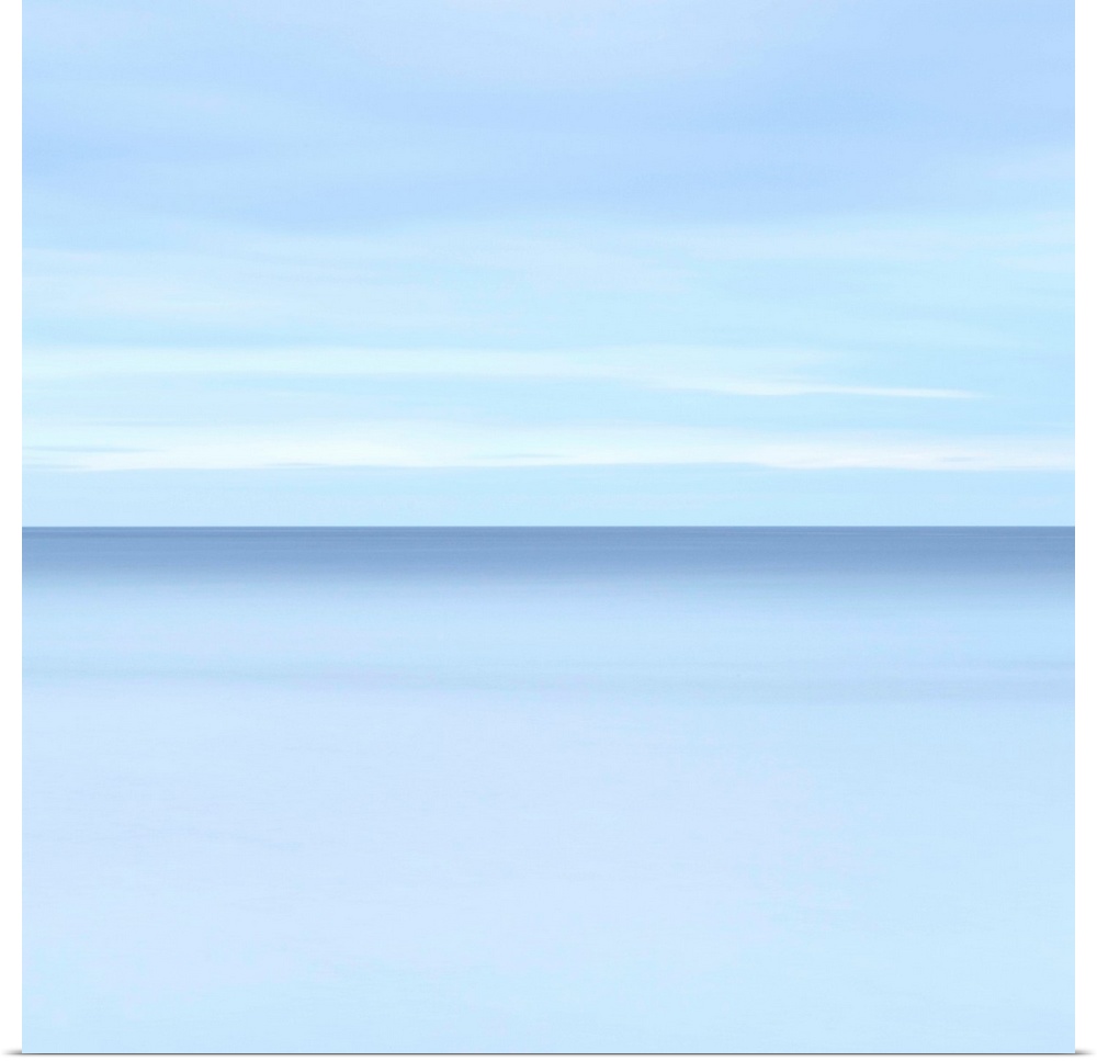 Abstract photograph resembling a calm oceanscape with a cloudy sky.
