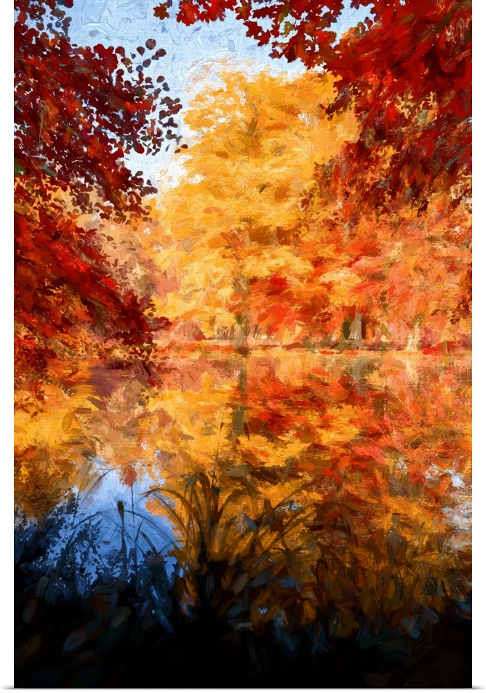 Autumn trees reflected in the water of a pond