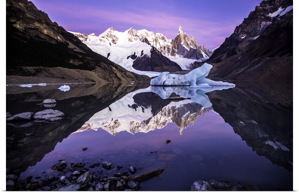 A glacier at the edge of a lake at the bottom of the Andes mountains in Argentina.