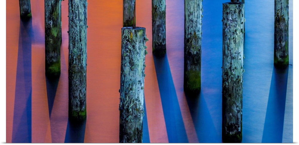 Pilings and harbor lights in Astoria, Oregon.