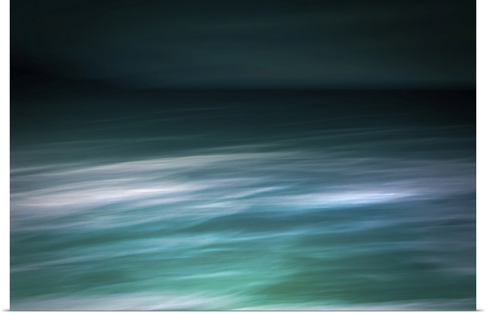 Modern photography abstract seascape abstract in teal and white with dark sky and waves.