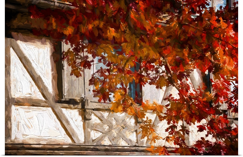 Half-timbered house with a tree in front in the fall. Expressionist photo or Painterly
