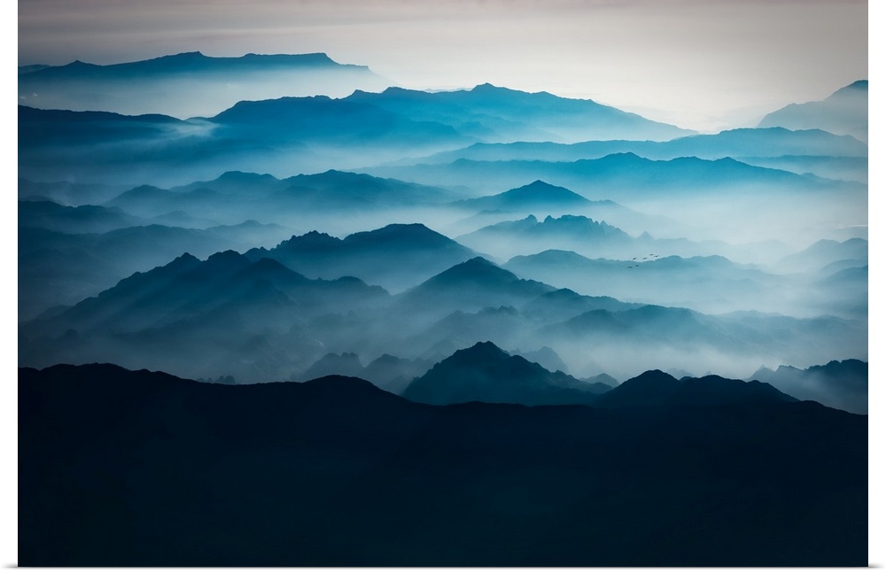 Blue mountains with mist taken from the sky, mountains of Asia