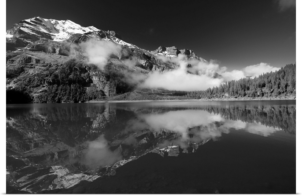 Mountain landscape is reflected in a beautiful lake