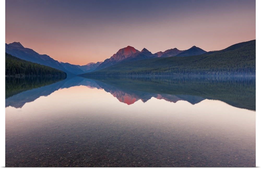 Peaceful Bowman Lake in sunset at Polebridge, Glacier National Park, Montana.