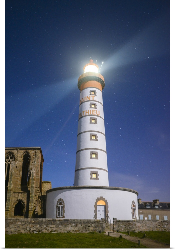 A photograph of a lighthouse on the coast of France.