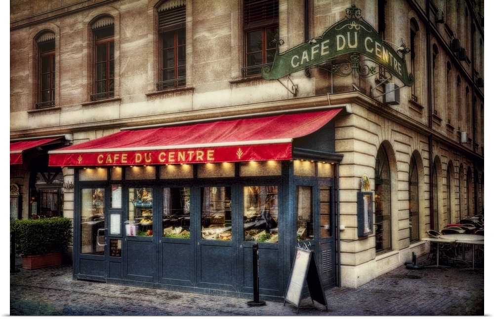 Red awning over the Cafe du Centre at a street corner in Geneva, Switzerland.
