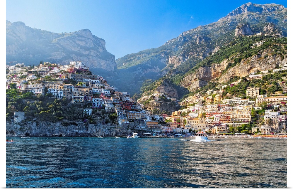 Fine art photo of the Mediterranean town of Positano nestled in the hills, seen from the ocean.