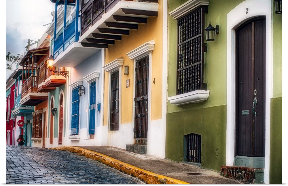 Fine art photo of a cobblestone road with colorful buildings in San Juan, Puerto Rico.
