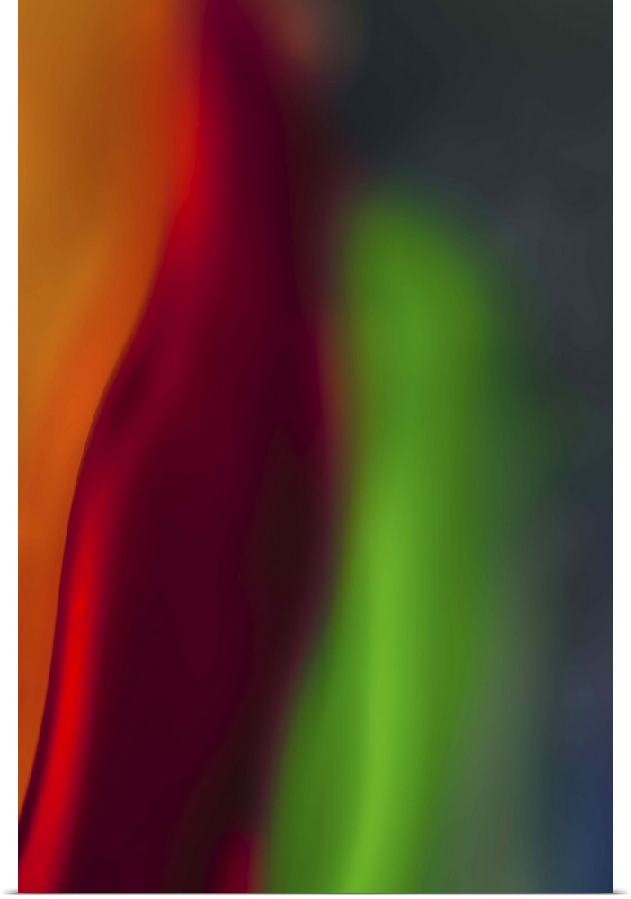 Abstract photograph in green and red vertical layers.