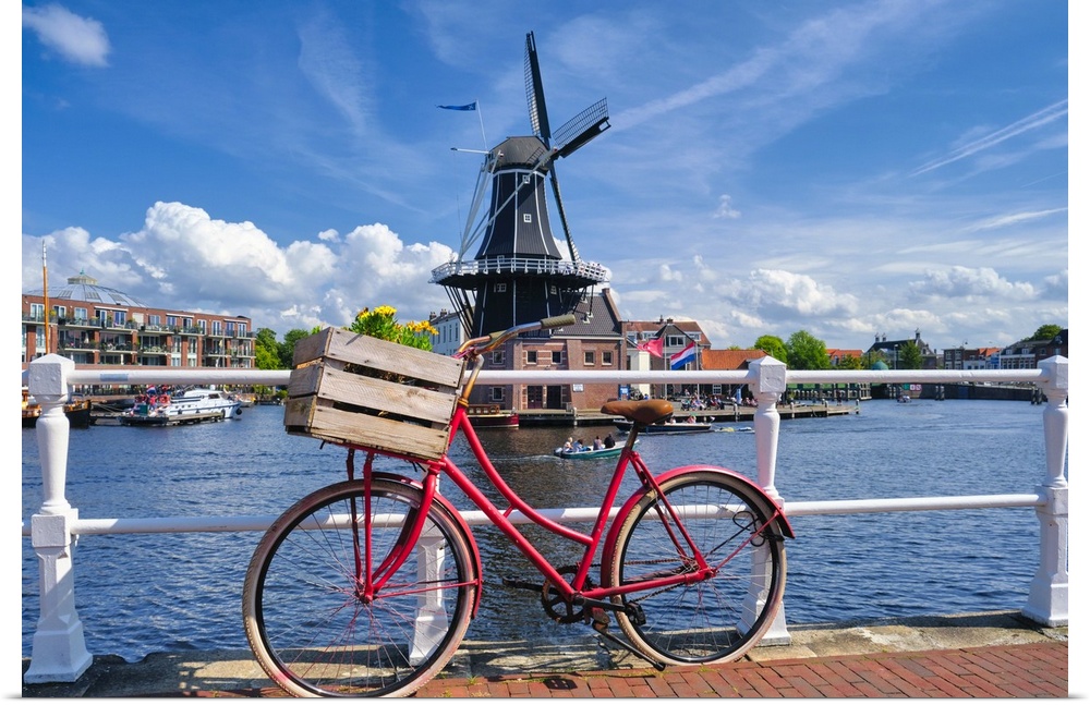 Old Bicycle on the Bridge with the De Adriaan Wndmill in the Background, Haarlem; The Netherlands