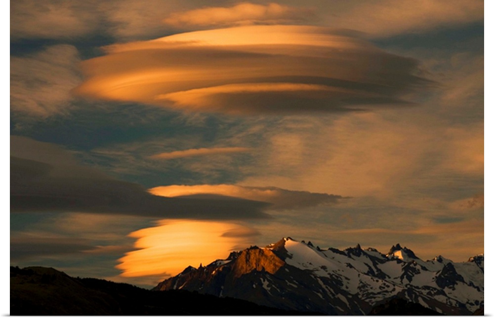 Lenticular clouds loom above the Andes Mountains, El Chalten, Argentina.