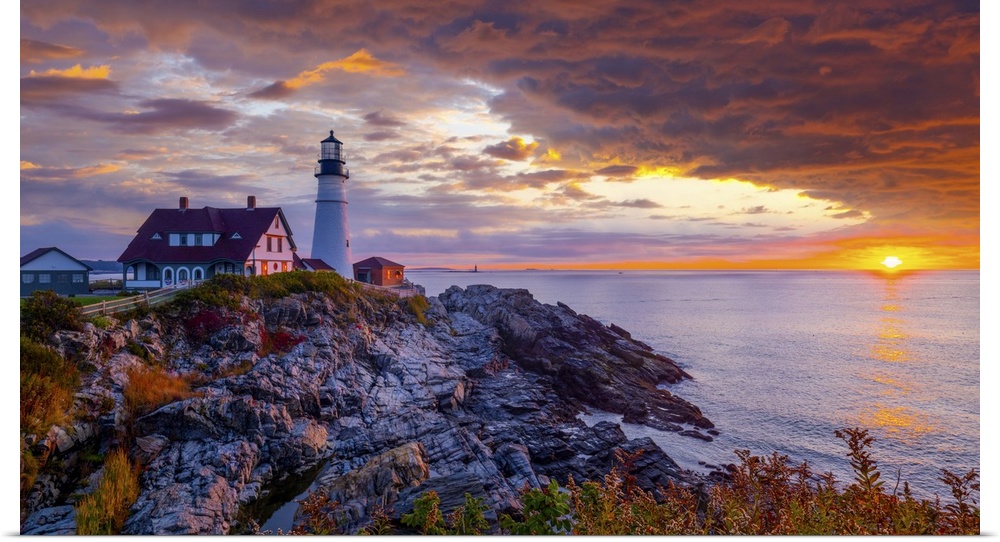 Portland Head Light is a historic lighthouse in Cape Elizabeth, Maine. A wonderful sunrise with intense red colors and a f...