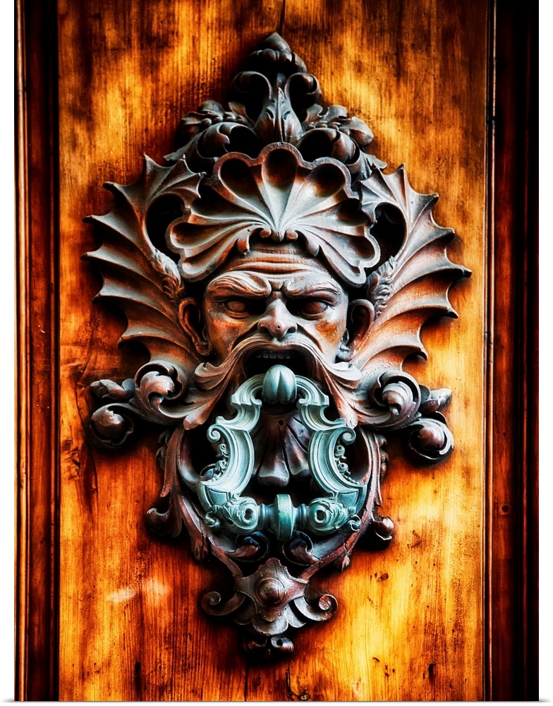 Close Up View of a Angry Man Face Door Knocker, Florence, Tuscany, Italy.