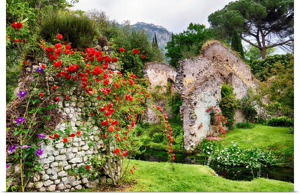 Garden with historic ruins and blooming flowers, Latina, Italy.
