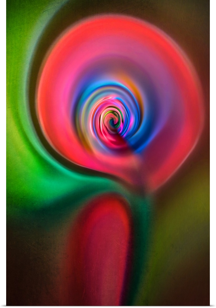 Abstract photograph in green and red swirling shapes, resembling a candle.