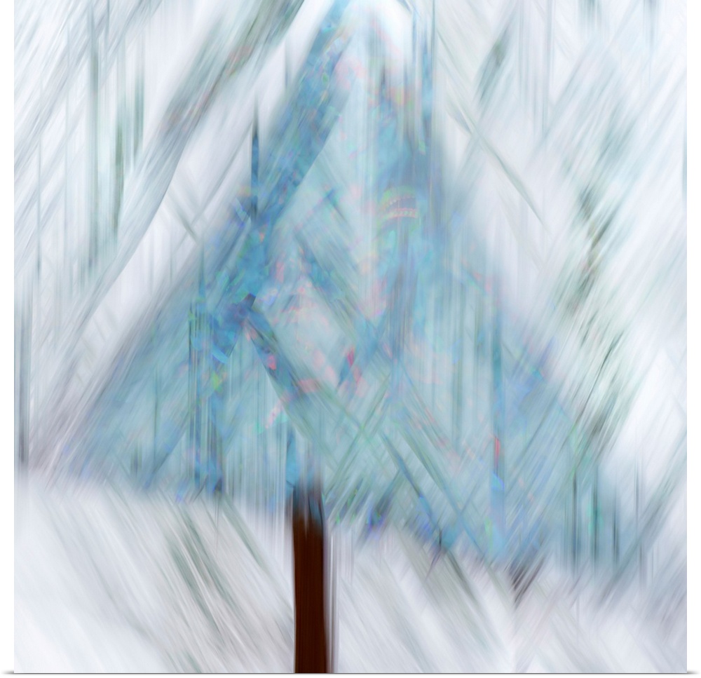 Abstract image of a tree decorated for the holidays with colourful lights. The tree was covered in snow, the lights were g...