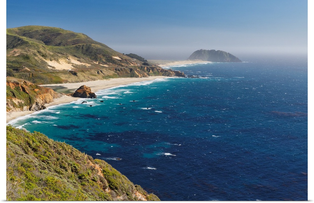 Big Sur Coast with Coastal Route 1 and the Point Sur Lighthouse, California, USA.