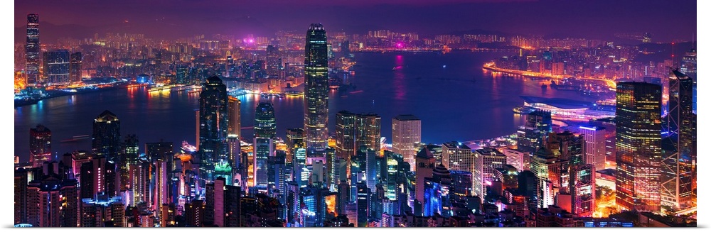 Panoramic image of the vibrant city of Hong Kong, China at night.
