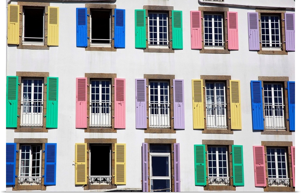 Multi-colored windows of an hotel white wall in France in Quiberon, Brittany, graphic set.