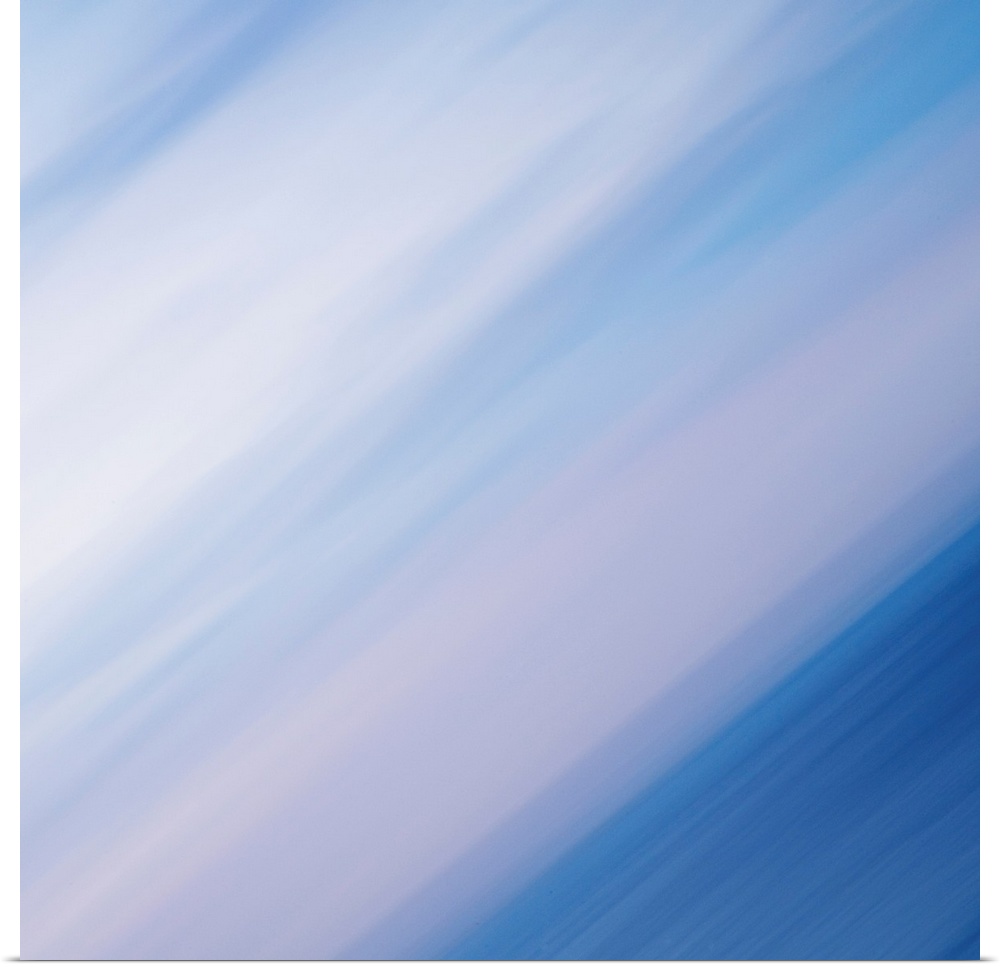 A contemporary abstract of strong energetic diagonal lines in blues, whites and soft palest pinks echoing skies and seas.