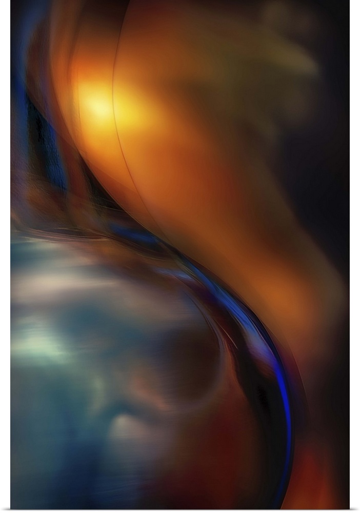 Abstract photograph of curved blue glass against orange.