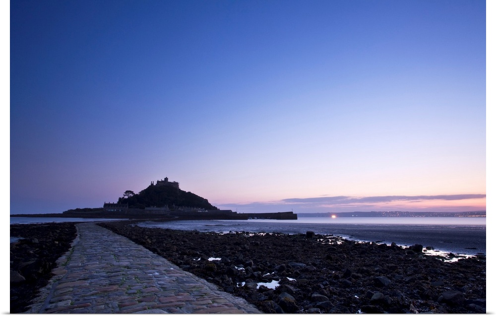 A beautiful cool blue dawn over the causeway at St. Michaels Mount in Cornwall, England, UK.
