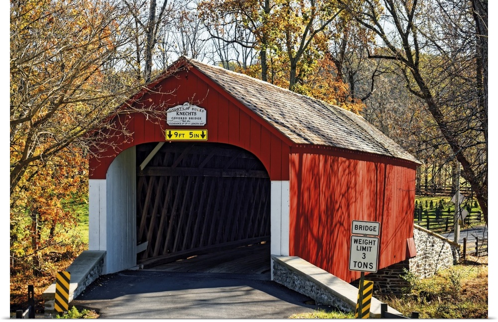 Scenic Fall View of the Knechts Covered Bridge over the Crook Creek, Bucks County, Pennsylvania, USA