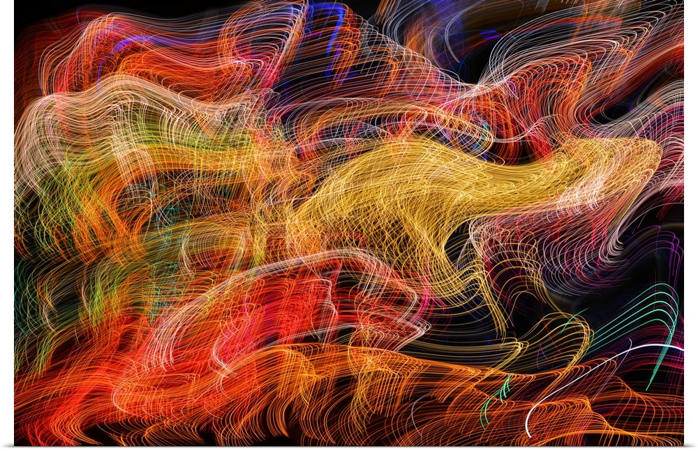 Abstract image created by a long exposure of moving lights.