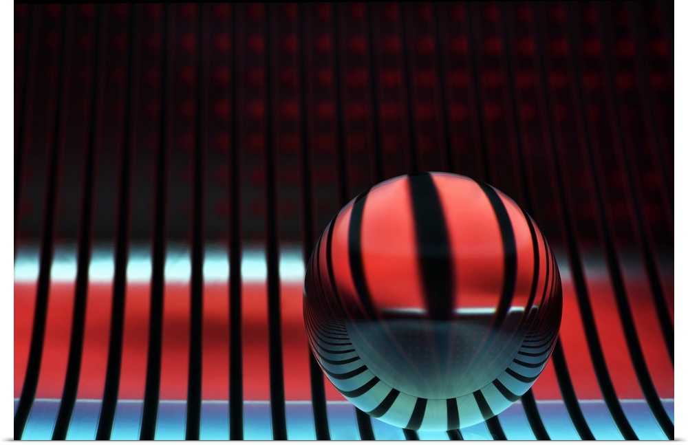 Abstract photo of a glass sphere reflecting stripes of light.