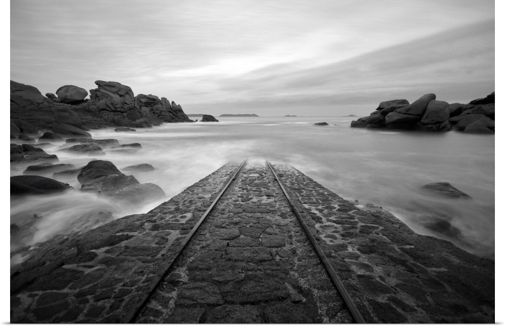 A place in Brittany called, SNSM, road for boats going into the sea, in black and white.