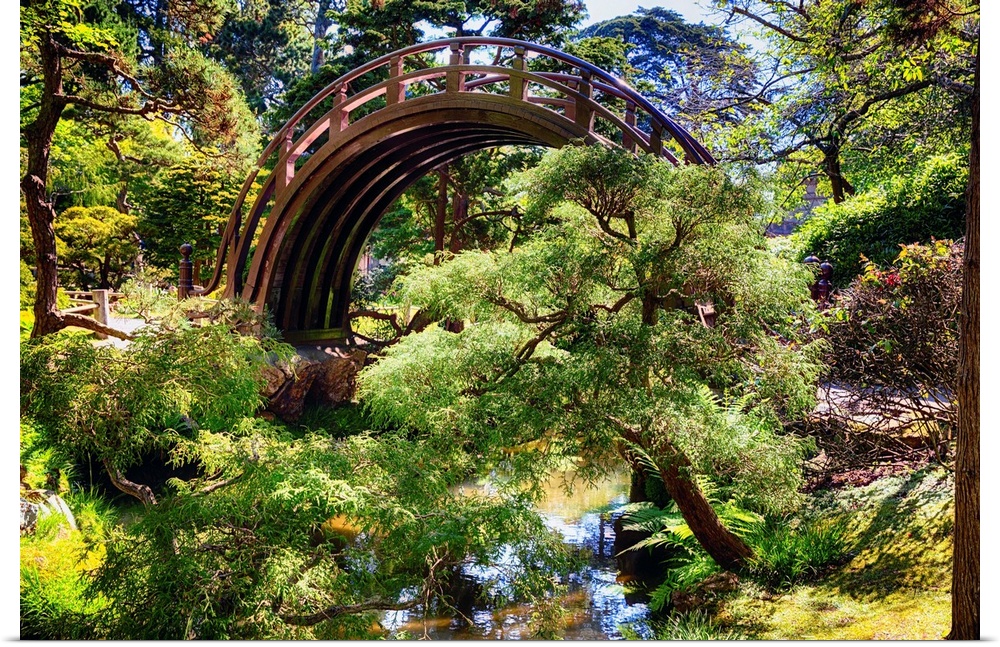 Moon Bridge Over a Small Creek in a Japanese Garden.